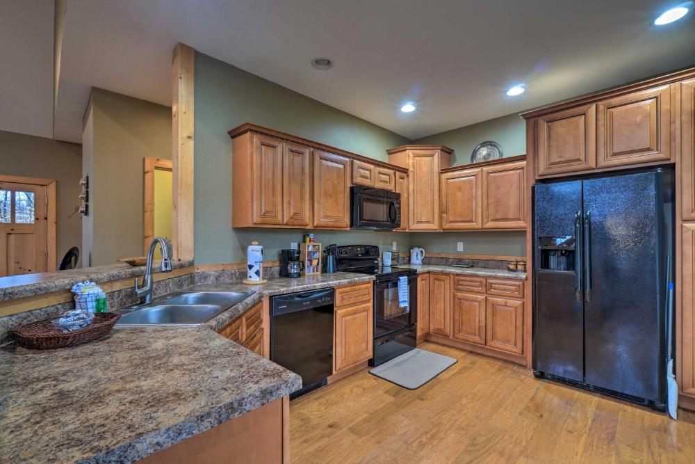 Sevierville Cabin with Lake Views and Wraparound Porch